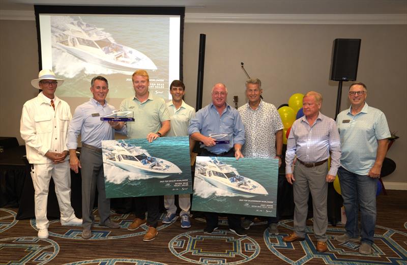 Scout awarding their top worldwide dealer and top salesperson - From left to right: Nate Anderson, Alan Lang, Andy Renne, James Pate, Len Renne, Dave Wallace, Steve Potts, Bret Potts photo copyright Scout Boats taken at  and featuring the Marine Industry class