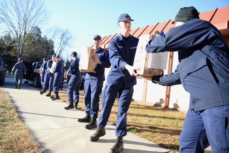 Personnel of Coast Guard Station St. Inigoes unload donated goods collected by the Pax River Chief Petty Officer Association on January 30, 2019 photo copyright Chief Petty Officer Patrick Gordon taken at 