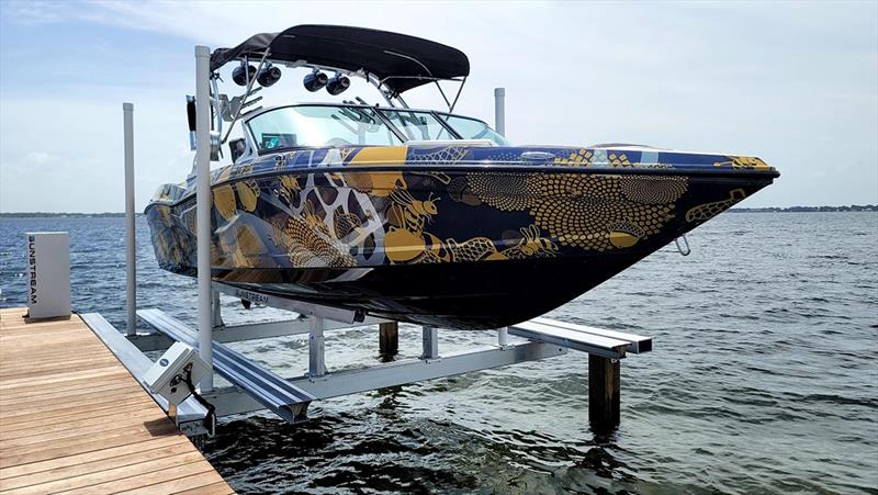 Sunstream® redefines boat lift technology with the world's fastest and sleekest piling boat lift – The Helix-P - photo © Sunstream Boat Lifts